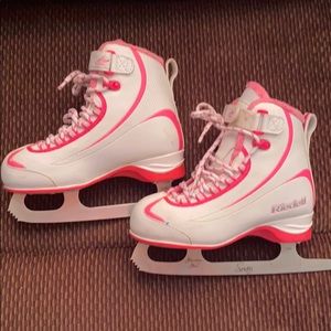 Pair of ice skating skates pink and white
